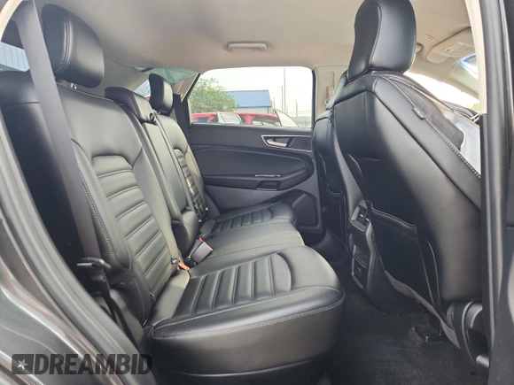 2020 Ford Edge SEL с VIN 2FMPK4J97LBA71577, выставлен на аукционе Copart как лот 60028525 с пробегом 66 365 миль миль и Списание • Salvage title. История ставок и продаж доступна на DreamBid. Изображение 11.