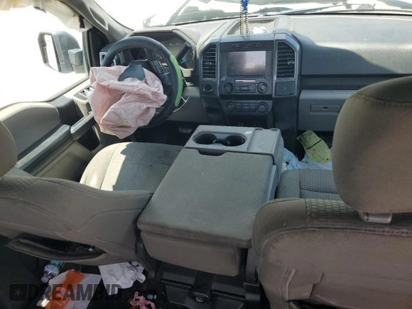 2019 Ford F-150 XL with VIN 1FTEW1C44KFA19563, listed as a Copart auction lot 52402655 with 147,071 mi miles and Non Repairable. Bid and sale history available at DreamBid. Image 8.