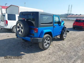 2016 Jeep Wrangler Sahara with VIN 1C4AJWBG9GL112139, listed as a IAAI auction lot 40286816 with 54,568 mi miles and . Bid and sale history available at DreamBid. Image 4.