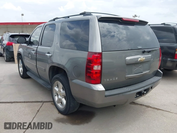 2007 Chevrolet Tahoe LTZ with VIN 1GNFC13J37J399493, listed as a IAAI auction lot 42656195 with 231,950 mi miles and . Bid and sale history available at DreamBid. Image 3.