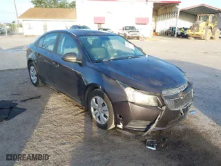 2014 Chevrolet Cruze LS with VIN 1G1PA5SH0E7336511, listed as a IAAI auction lot 41954161 with 73,798 mi miles. Bid and sale history available at carsss.com. Image 1.