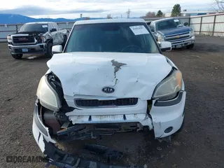 2010 Kia Soul + with VIN KNDJT2A20A7701556, listed as a IAAI auction lot 41814987 with 201,712 mi miles. Bid and sale history available at carsss.com. Image 12.