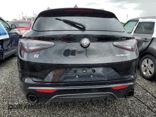 2024 Alfa Romeo Stelvio Veloce z VIN ZASPAKBNXR7D76183, wystawiony jako Copart lot #74106334 z przebiegiem Nie podano mil oraz Nie do naprawy • Non repairable. Historia ofert i sprzedaży dostępna na DreamBid. Obrazek 6.