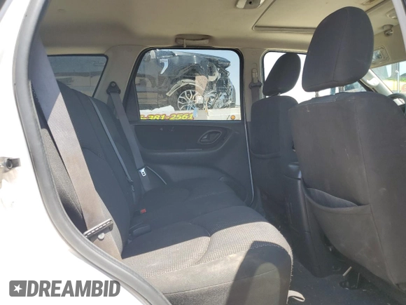 2006 Mazda Tribute S with VIN 4F2YZ04166KM12531, listed as a Copart auction lot 63354374 with 196,753 mi miles and Salvage Title. Bid and sale history available at carsss.com. Image 11.