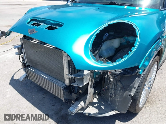 2017 MINI Convertible Cooper S z VIN WMWWG9C30H3C80917, wystawiony jako IAAI lot #42227320 z przebiegiem 38 490 mil mil oraz . Historia ofert i sprzedaży dostępna na DreamBid. Obrazek 18.