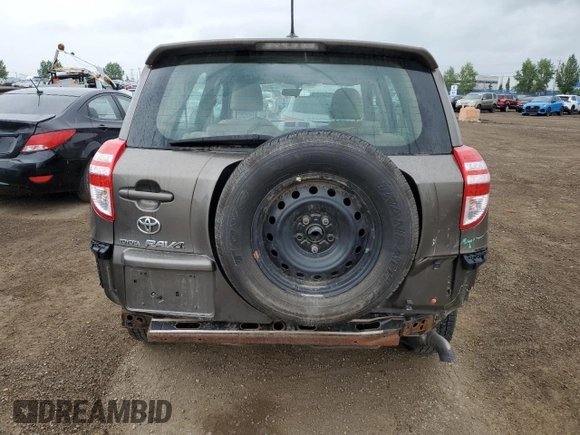 2010 Toyota RAV4 with VIN 2T3ZF4DV3AW031047, listed as a Copart auction lot 60877665 with 214,938 mi miles and Salvage title. Bid and sale history available at DreamBid. Image 6.