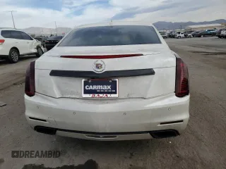 2014 Cadillac CTS Premium RWD z VIN 1G6AT5S30E0142990, wystawiony jako Copart lot #50801685 z przebiegiem 74 583 mil mil oraz Szkody całkowita. Historia ofert i sprzedaży dostępna na DreamBid. Obrazek 6.