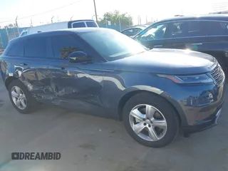 2025 Land Rover Range Rover Velar S с VIN SALYJ2EX5SA392822, выставлен на аукционе IAAI как лот 42259634 с пробегом 4 289 миль миль и . История ставок и продаж доступна на DreamBid. Изображение 13.