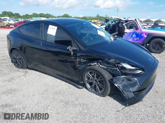 2024 Tesla Model Y z VIN 7SAYGDED6RF191135, wystawiony jako IAAI lot #41790922 z przebiegiem 17 154 mil mil oraz . Historia ofert i sprzedaży dostępna na DreamBid. Obrazek 1.