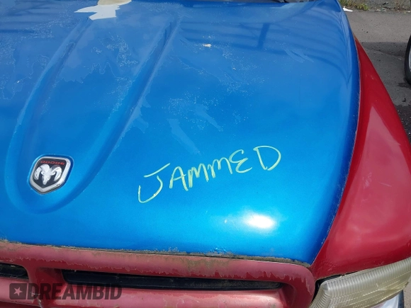 2001 Dodge Dakota Sport z VIN 1B7GL2AN31S115001, wystawiony jako IAAI lot #42452634 z przebiegiem Nie podano mil oraz . Historia ofert i sprzedaży dostępna na DreamBid. Obrazek 10.