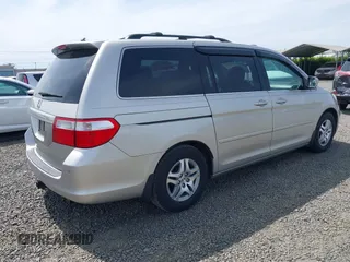 2006 Honda Odyssey EX-L z VIN 5FNRL38786B411187, wystawiony jako IAAI lot #42316075 z przebiegiem 272 658 mil mil oraz . Historia ofert i sprzedaży dostępna na DreamBid. Obrazek 4.