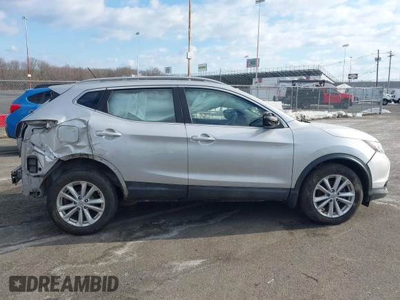 2017 Nissan Rogue SL z VIN JN1BJ1CR9HW108652, wystawiony jako IAAI lot #41418435 z przebiegiem 54 481 mil mil oraz . Historia ofert i sprzedaży dostępna na DreamBid. Obrazek 13.