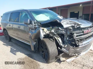 2022 GMC Yukon XL SLT with VIN 1GKS2GKT3NR233736, listed as a IAAI auction lot 37293147 with 27,196 mi miles. Bid and sale history available at carsss.com. Image 1.