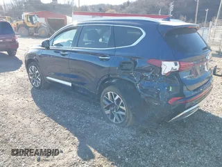 2021 Hyundai Santa Fe Calligraphy z VIN 5NMS5DAL4MH352689, wystawiony jako IAAI lot #41740911 z przebiegiem 15 589 mil mil oraz . Historia ofert i sprzedaży dostępna na DreamBid. Obrazek 3.