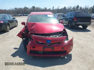 2012 Toyota Prius Two z VIN JTDZN3EU2C3071001, wystawiony jako IAAI lot #42085343 z przebiegiem Nie podano mil oraz . Historia ofert i sprzedaży dostępna na DreamBid. Obrazek 11.