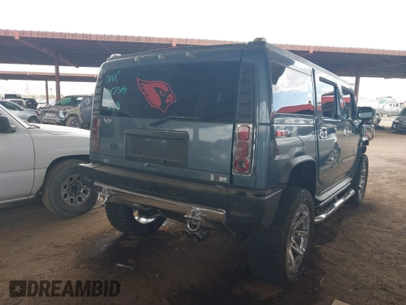 2005 Hummer H2 SUV with VIN 5GRGN23U25H107505, listed as a IAAI auction lot 41703768 with 213,723 mi miles. Bid and sale history available at carsss.com. Image 4.