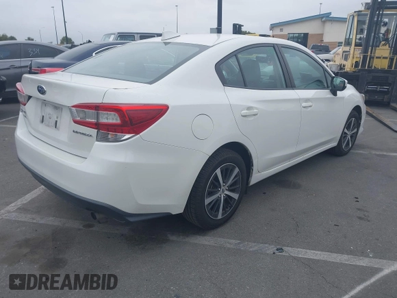 2021 Subaru Impreza Premium with VIN 4S3GKAV61M3604298, listed as a IAAI auction lot 42011198 with 50,667 mi miles and . Bid and sale history available at DreamBid. Image 4.