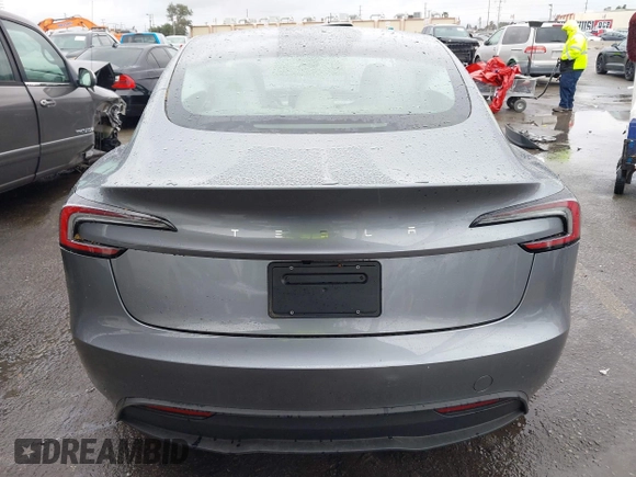 2025 Tesla Model 3 Long Range with VIN 5YJ3E1EA2SF885408, listed as a IAAI auction lot 41778498 with 1,566 mi miles and . Bid and sale history available at DreamBid. Image 16.