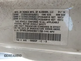 2014 Honda Odyssey Touring with VIN 5FNRL5H94EB071788, listed as a IAAI auction lot 42523959 with 244,734 mi miles and . Bid and sale history available at DreamBid. Image 9.