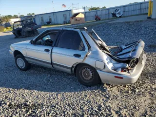 1991 Nissan Sentra E с VIN JN1EB31P1MU025388, выставлен на аукционе Copart как лот 75665734 с пробегом 213 053 миль миль и На запчасти • Non repairable. История ставок и продаж доступна на DreamBid. Изображение 2.