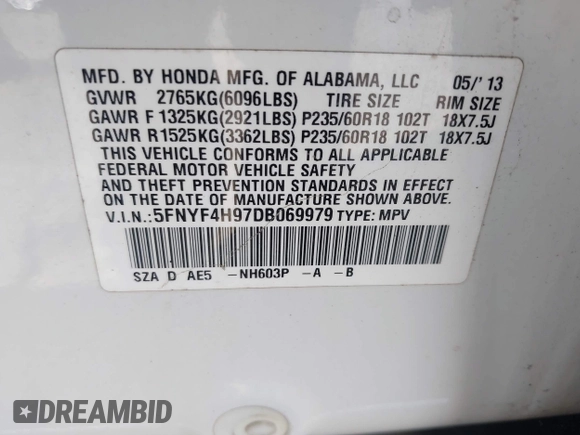 2013 Honda Pilot Touring with VIN 5FNYF4H97DB069979, listed as a IAAI auction lot 42133922 with 276,574 mi miles and . Bid and sale history available at carsss.com. Image 9.