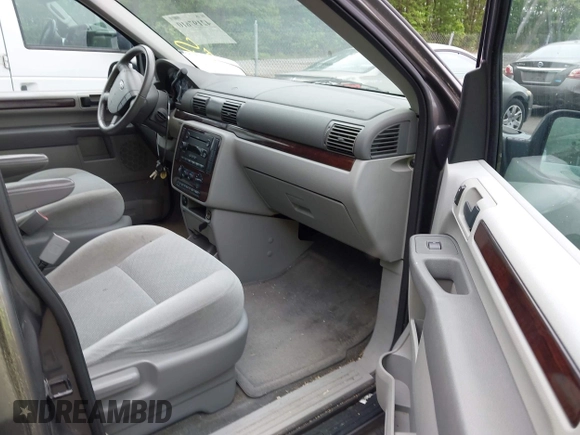 2006 Ford Freestar SEL z VIN 2FMZA52256BA51562, wystawiony jako IAAI lot #42197610 z przebiegiem 120 768 mil mil oraz . Historia ofert i sprzedaży dostępna na DreamBid. Obrazek 5.