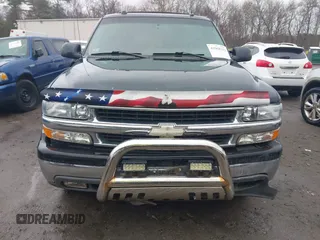 2004 Chevrolet Suburban LT z VIN 1GNFK16T84J170724, wystawiony jako IAAI lot #41968221 z przebiegiem 286 281 mil mil oraz . Historia ofert i sprzedaży dostępna na DreamBid. Obrazek 12.