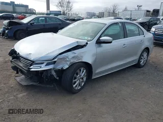 2014 Volkswagen Jetta Sedan SE w/Connectivity/Sunroof PZEV with VIN 3VWD17AJ5EM362888, listed as a IAAI auction lot 41787904 with 143,332 mi miles. Bid and sale history available at carsss.com. Image 17.