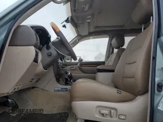 2002 Lexus LX 470 z VIN JTJHT00W923514121, wystawiony jako Copart lot #87761105 z przebiegiem 247 752 mil mil oraz Szkody całkowita. Historia ofert i sprzedaży dostępna na DreamBid. Obrazek 7.