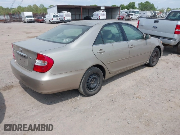 2004 Toyota Camry LE with VIN 4T1BE32K14U846576, listed as a IAAI auction lot 42086537 with 202,027 mi miles. Bid and sale history available at carsss.com. Image 4.