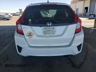 2016 Honda Fit LX with VIN JHMGK5H58GX031938, listed as a Copart auction lot 63101705 with 102,138 mi miles and Salvage title. Bid and sale history available at DreamBid. Image 6.