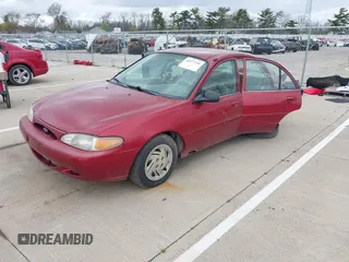1998 Ford Escort SE z VIN 1FAFP13P4WW124031, wystawiony jako IAAI lot #42077199 z przebiegiem 170 165 mil mil oraz . Historia ofert i sprzedaży dostępna na DreamBid. Obrazek 2.