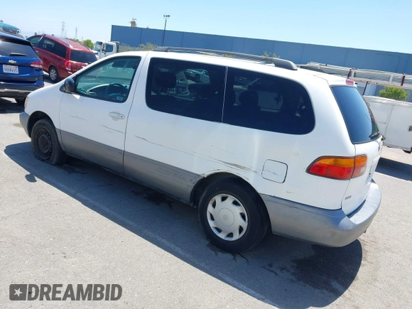 2000 Toyota Sienna CE z VIN 4T3GF19C8YU307987, wystawiony jako IAAI lot #42363309 z przebiegiem 179 374 mil mil oraz . Historia ofert i sprzedaży dostępna na DreamBid. Obrazek 3.