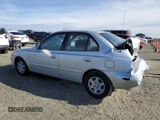2003 Hyundai Accent GL with VIN KMHCG45C13U429952, listed as a Copart auction lot 77835874 with 120,554 mi miles and Salvage Title. Bid and sale history available at carsss.com. Image 2.