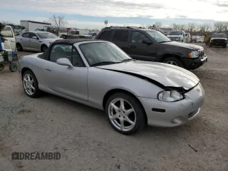 2001 Mazda MX-5 Miata with VIN JM1NB353510214097, listed as a Copart auction lot 50306595 with 111,359 mi miles and Salvage Title. Bid and sale history available at DreamBid. Image 4.