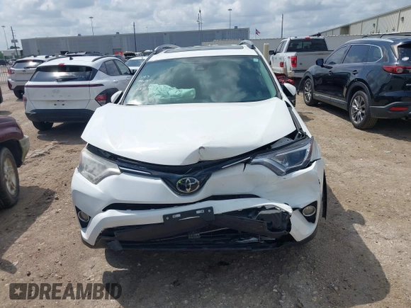 2017 Toyota RAV4 XLE with VIN JTMWFREV8HJ118885, listed as a IAAI auction lot 42097180 with 122,481 mi miles. Bid and sale history available at carsss.com. Image 13.