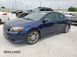 2008 Scion tC Spec z VIN JTKDE167080234334, wystawiony jako Copart lot #60552105 z przebiegiem 136 577 mil mil oraz Szkoda całkowita • Salvage title. Historia ofert i sprzedaży dostępna na DreamBid. Obrazek 1.