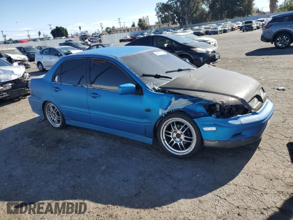 2002 Mitsubishi Lancer OZ-Rally z VIN JA3AJ86E62U070034, wystawiony jako Copart lot #86914144 z przebiegiem 180 675 mil mil oraz Szkoda całkowita • Salvage title. Historia ofert i sprzedaży dostępna na DreamBid. Obrazek 4.