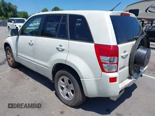 2011 Suzuki Grand Vitara Premium z VIN JS3TD0D2XB4103016, wystawiony jako IAAI lot #42568549 z przebiegiem 156 595 mil mil oraz . Historia ofert i sprzedaży dostępna na DreamBid. Obrazek 3.