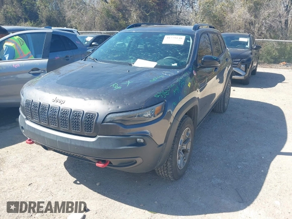 2022 Jeep Cherokee Trailhawk with VIN 1C4PJMBX4ND535037, listed as a IAAI auction lot 41779140 with 49,733 mi miles. Bid and sale history available at carsss.com. Image 19.