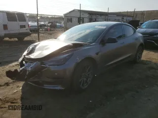 2022 Tesla Model 3 Long Range with VIN 5YJ3E1EBXNF272496, listed as a Copart auction lot 43973435 with 28,450 mi miles and Salvage Title. Bid and sale history available at DreamBid. Image 1.