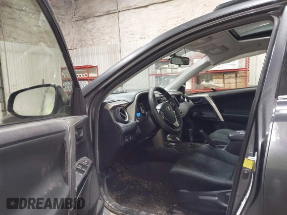 2013 Toyota RAV4 XLE with VIN JTMRFREV2DD027259, listed as a IAAI auction lot 41945054 with 116,513 mi miles and . Bid and sale history available at carsss.com. Image 5.
