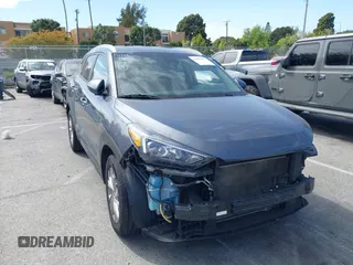 2021 Hyundai Tucson Value z VIN KM8J33A47MU396727, wystawiony jako IAAI lot #42033273 z przebiegiem 72 978 mil mil oraz . Historia ofert i sprzedaży dostępna na DreamBid. Obrazek 1.
