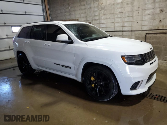 2020 Jeep Grand Cherokee Trackhawk with VIN 1C4RJFN97LC141522, listed as a Copart auction lot 80134014 with 53,494 mi miles and Salvage title. Bid and sale history available at DreamBid. Image 4.