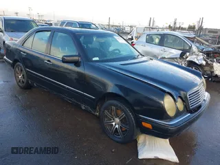 1997 Mercedes-Benz E-Class with VIN WDBJF72F1VA281514, listed as a IAAI auction lot 41586496 with 283,212 mi miles. Bid and sale history available at carsss.com. Image 1.