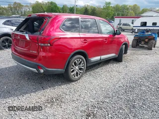 2016 Mitsubishi Outlander SE z VIN JA4AZ3A36GZ037753, wystawiony jako IAAI lot #42215227 z przebiegiem 71 135 mil mil oraz . Historia ofert i sprzedaży dostępna na DreamBid. Obrazek 4.