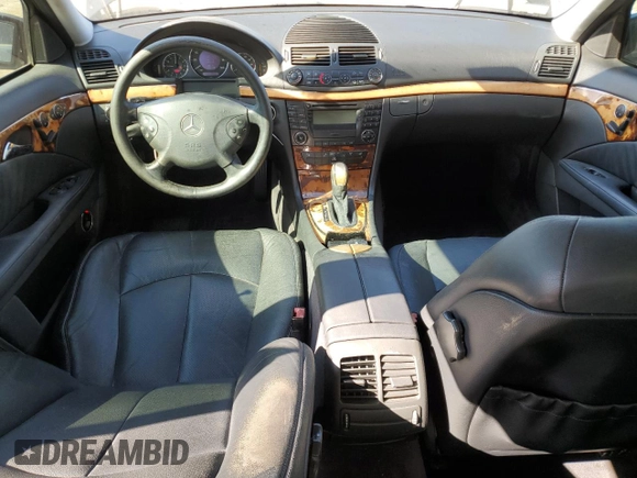 2003 Mercedes-Benz E-Class 3.2L with VIN WDBUF65J03A281430, listed as a Copart auction lot 77086054 with 121,080 mi miles and Salvage Title. Bid and sale history available at carsss.com. Image 8.