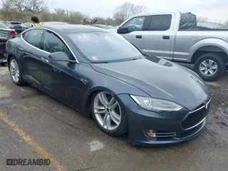 2016 Tesla Model S 90D with VIN 5YJSA1E27GF122503, listed as a IAAI auction lot 41947580 with 128,318 mi miles. Bid and sale history available at carsss.com. Image 1.