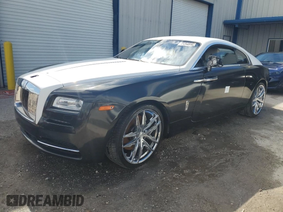 2014 Rolls-Royce Wraith z VIN SCA665C59EUX84411, wystawiony jako Copart lot #74548964 z przebiegiem Nie podano mil oraz Nie do naprawy. Historia ofert i sprzedaży dostępna na DreamBid. Obrazek 1.