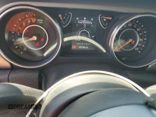 2020 Jeep Wrangler Sport with VIN 1C4GJXAG9LW203468, listed as a Copart auction lot 63586585 with 58,180 mi miles and Salvage title. Bid and sale history available at DreamBid. Image 9.